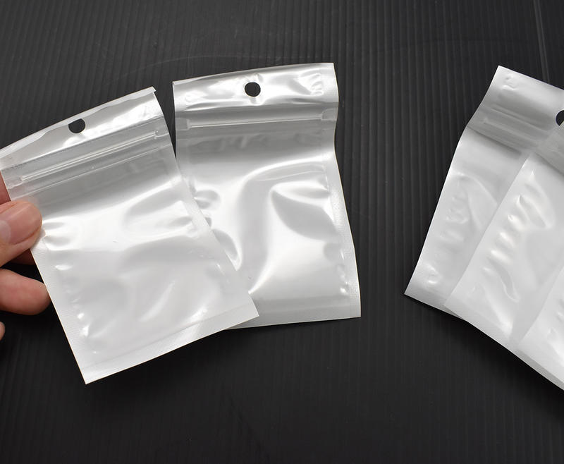 珠光袋 6X10cm(20入) 白色半透明 夾鏈袋 數據線手機殼包裝袋 珠光膜自封袋