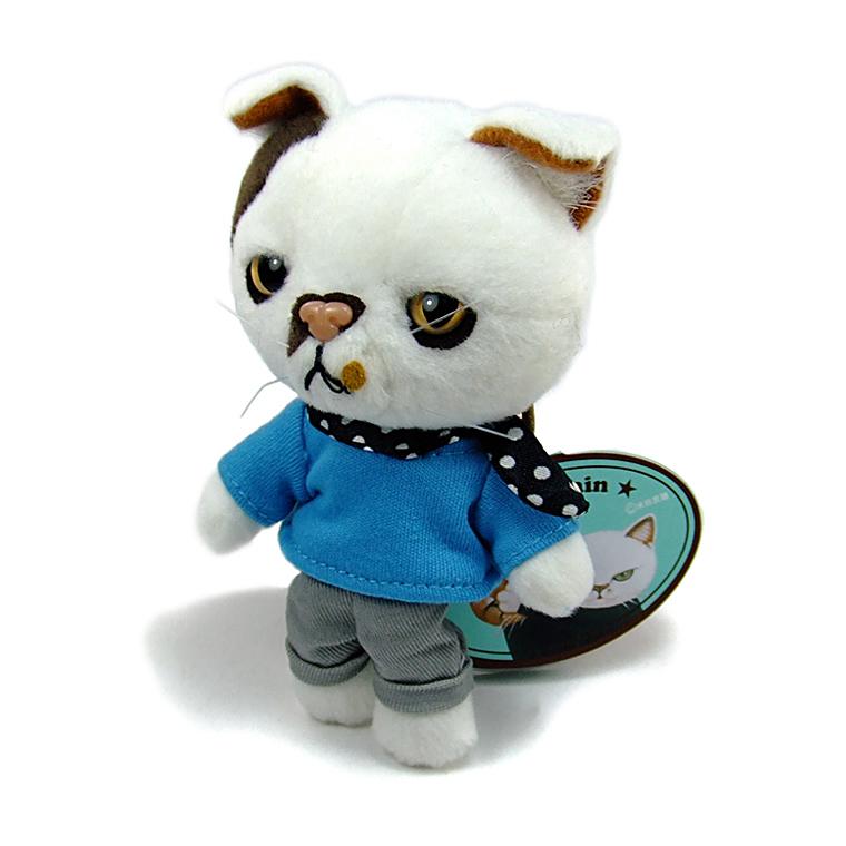 茶貓Mimi吊飾，由日本畫家米田民穗的畫作誕生,貓咪的外型製作特別注重小細節如五官、衣服、褲子還有圍巾