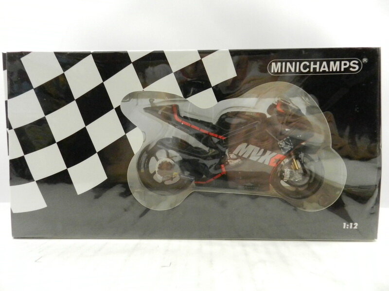 A Minichamps diecast 1:12 Yamaha YZR-M1 for the Valentino Rossi collection, Team Petronas Yamaha SRT