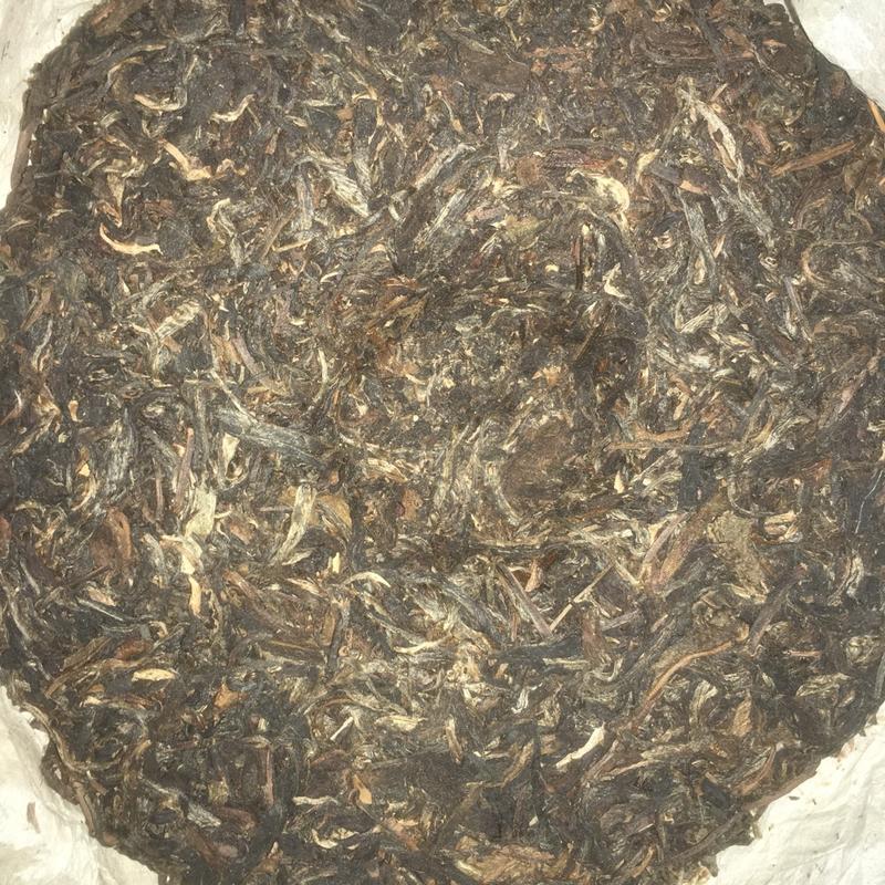 易武麻黑普洱茶（2009年、純料、質淨、氣柔、水甜）