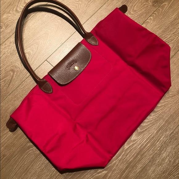 Longchamp 咖啡色皮飾邊長背帶折疊水餃包 (紅)