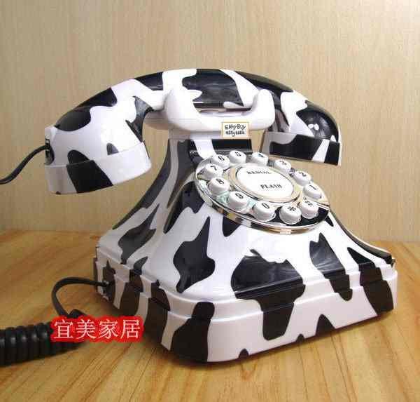 【EZBUY】熱賣 現代時尚座機 創意電話機 可愛電話 固定座機電話 復古仿古電話 黑色 奶牛 橙色